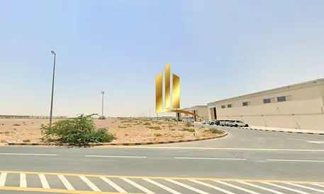 Corner plot of land for sale in Emirates Industrial City, Al Sajaa.Land area: 114,040 sq ft