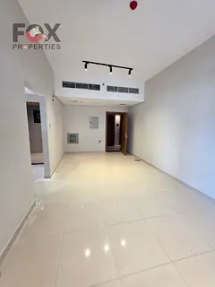 Open-view unit in central Ajman, close to all services, with large room and hall spaces, flexible pa