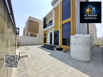 Villa with all registration and ownership fees included, on the main street, ready to move in, in one of the most prestigious areas of Ajman, freehold