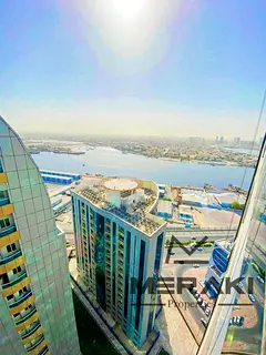 Own a 1-Bedroom Apartment with Living Room in the Heart of the City with Full Creek View