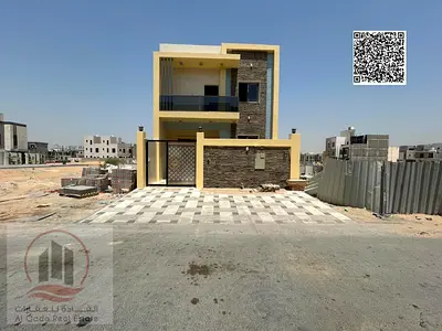 فيلا للبيع بعجمان منطقة الباهية شاملة رسوم التسجيل (5 غرف ماستر + مجلس  كبير بالمغاسل +صالة كبيرة +غرفة خادمة + مطبخ مجهز )