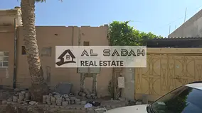 For sale: A house in Umm Khanoor, divided into two sections. The first section has 3 bedrooms, a liv