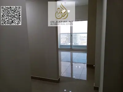 Two bedrooms, a living room with a balcony, two bathrooms, and parking directly on Mohammed Bin Zayed Road.