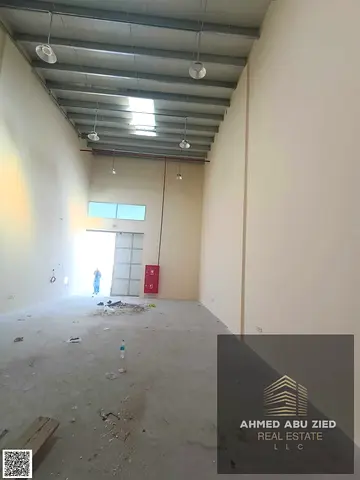Annual warehouse for rent in Al Jurf Industrial 2, 3,000 sq.ft with new mezzanine, 30 KW power, prime location near Sheikh Mohammed Bin Zayed Road.
