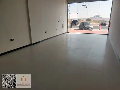 A distinguished commercial shop available for annual rent, located in Ajman Emirate – Al Jurf 3 area. It enjoys an excellent strategic corner location