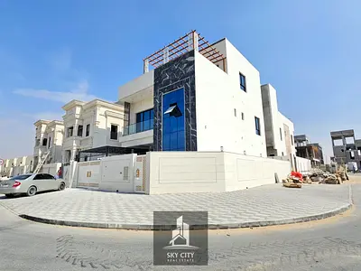 فيلا أحلامك: فيلا زاوية من طابقين وتراس على السطح، شاملة رسوم التسجيل والتكييف، بسعر مغرٍ. تشطيبات ممتازة، قريبة من شارع الشيخ محمد بن زايد.