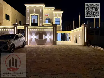 Villa for sale in Ajman, Al Muwaihat area. 5 master bedrooms, majlis, living room, and maid's room. Freehold ownership for all nationalities. Bank fin