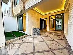 For sale villa - two floors &amp; a large yard - close to Sheikh Mohammed bin Zayed Street - free ow