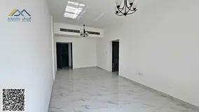 Two-bedroom apartment with a living room and three bathrooms for rent in Al Rawda 3, Sheikh Ammar St