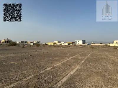 للبيع قطعة ارض مميزة شارع وسكة بمنطقة المنامة 14