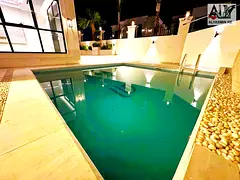 Own a fully furnished villa directly behind the park, ready with electricity, water, and air conditi