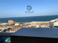 Own a 2-bedroom apartment with living room in Ajman One Towers, prime strategic location, high floor