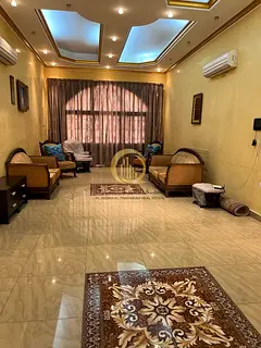 For sale: residential villa in Al Quoz area, Wasit Suburb, Sharjah. Close to shops. Land area: 7,568