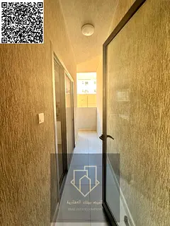 Annual Rent in Al Nuaimiya 1 – Near Al Ain Hotel Two-bedroom apartment with a living room and exce