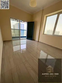 For annual rent, a two-bedroom apartment with a living room in Al Nuaimiya 3, with comfortable space
