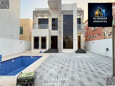 فيلا فاخرة بمسبح وتصميم هندسي راقٍ في الروضة 2 على شارع الشيخ عمار | 5 غرف ماستر + مجلس + صالتين | السعر شامل الكهرباء والمياه والمكيفات