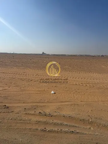Land for sale in Al-Sajaa Industrial Area, freehold ownership for all nationalities, prime location on Al-Qasimia Road