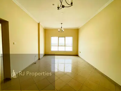 Prime location - 1 BR apartment - Neat And Clean family building - Easy Exit To Dubai - Close To School Zone