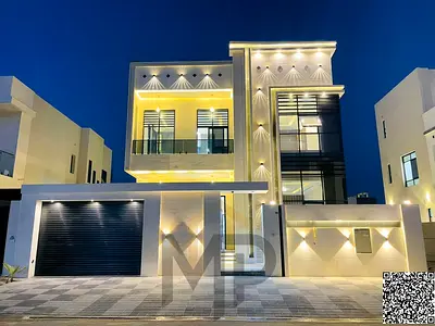 Villa for sale in Al Zahiyah, Ajman | Two floors + roof | 5 master bedrooms | Majlis and living room | Kitchen + maid's room | Yard | Includes fees an