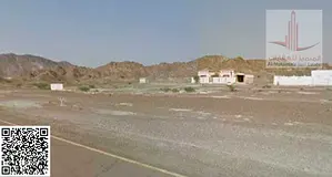 Land for sale in Ajman, Masfout, Block 1, residential/commercial (G+1), area 3095 sq ft, asking pric
