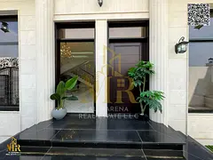 Own a luxurious two-story villa with a rooftop in the heart of Al Helio 2, Ajman, combining modern d