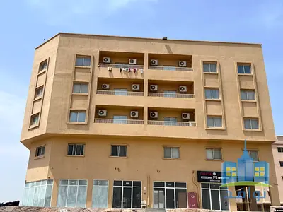 بنايه للبيع في ام القيوين خلف ماكدونالز مباشرة