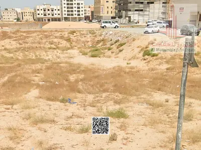 أرض سكني تجاري للبيع في العالية عجمان على شارعين تصريح بناء أرضي + 26 طابق مساحة 17200 قدم موقع استراتيجي قريب من الشارع الرئيسي فرصة استثمارية نادرة