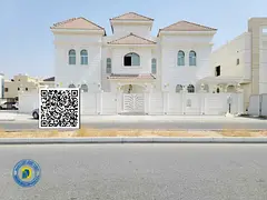 Corner villa for sale in Al Alia area, Ajman, European design, price includes water, electricity and
