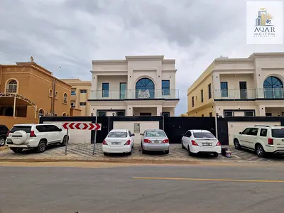 Spacious 5-Bedroom Villa for Sale in Al Rawda 3 | Prime Location Near Al Salam Street