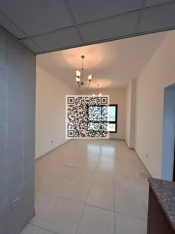 شقة واسعة مكونة من 3 غرف نوم للبيع في برج بارادايس ليك B6، مدينة الإمارات، عجمان | تكييف مركزي وإطلالات مفتوحة