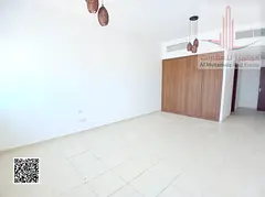 Apartment for sale in Ajman Towers, 2 master bedrooms and living room, 1,458 sq. ft., with balcony a