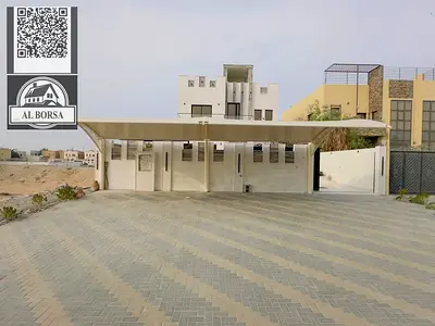 For sale: A luxurious villa in Al Muwaihat 1 consisting of 5 master bedrooms, a majlis, a living room with a kitchen, and a maid's room.