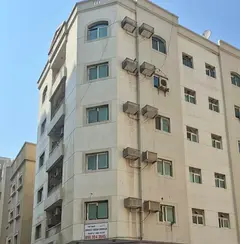 Corner building for sale in Sharjah, Al Majaz area, East District