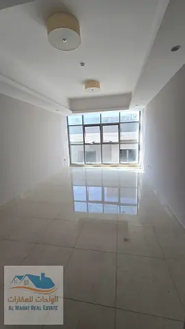 For annual rent – ​​One bedroom and living room with balcony in Gulf Tower B | Al Rashidiya 1