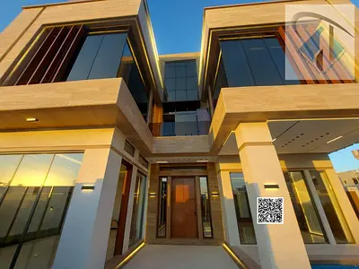 A luxurious villa with a modern design and high-end finishes, featuring a garden, private pool, elevator, and central air conditioning. The price incl