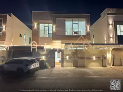 A villa for sale in Al Zahiyah, Ajman, including water, electricity, and air conditioning. Just one