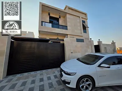 Villa for rent in Al Yasmin area, 5 master bedrooms, majlis, living room, ground floor, first floor, and roof, with kitchen and maid's room.