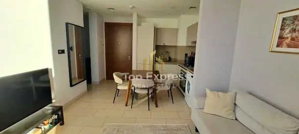 Stylish 1-Bedroom Apartment | Fully Furnished | Pool and Burj View |