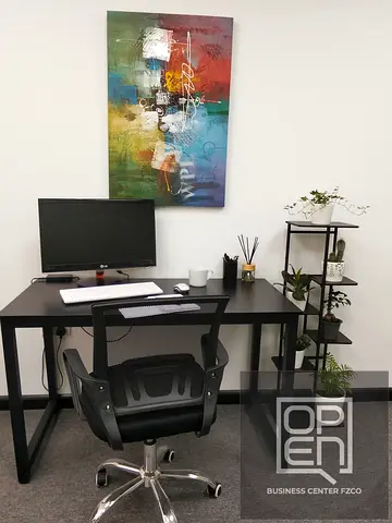 Desk co-working space within an office unit