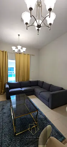 One-bedroom apartment with a living room in City Tower, large size of 980 sq. ft., 2 bathrooms, balcony, and fully furnished.
