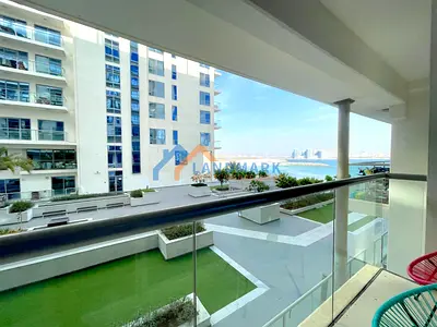 Spacious fully furnished 2 BR- Duplex apt with beach access