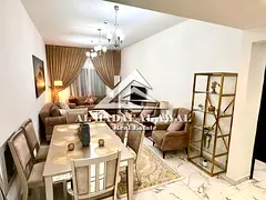 Muwailih Commercial: Two bedrooms and a living room with three bathrooms and a balcony. Both bedroom