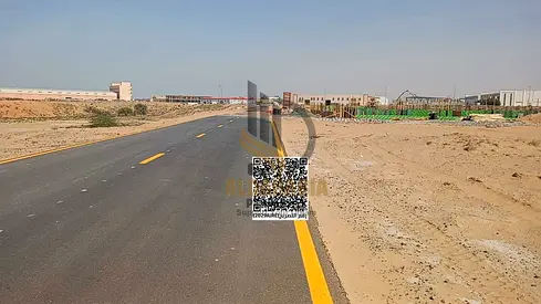 strong investment opportunity in a growing industrial and commercial zone. This large plot is located in Umm Al Thu'ub Industrial Area, positioned clo