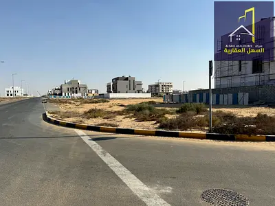 للبيع – قطعة أرض في مدينة تلال (زاوية على شارعين) - الشارقة