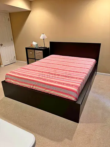 IKEA Malm king size bed frame with mattress.