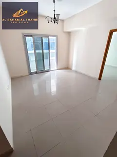 One bedroom and living room apartment for rent in Al Taawun with a balcony