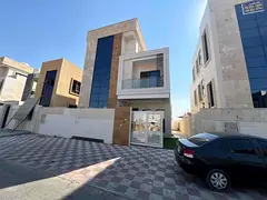 Villa for sale in Ajman Al Yasmeen area 5 master bedrooms, a living room, a kitchen, and a maid'