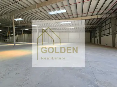 A huge investment warehouse with high ceilings in a strategic open location in the new Umm Al Quwain industrial area.
