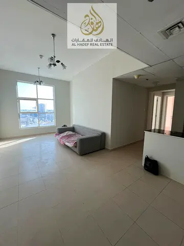 For rent: a beautiful 2-bedroom apartment with a spacious living room in City Tower, featuring an open view that fills the space with natural light an