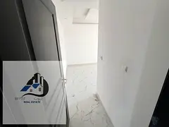 Two bedrooms and a living room for rent in Ajman, first occupancy, Al Alia area